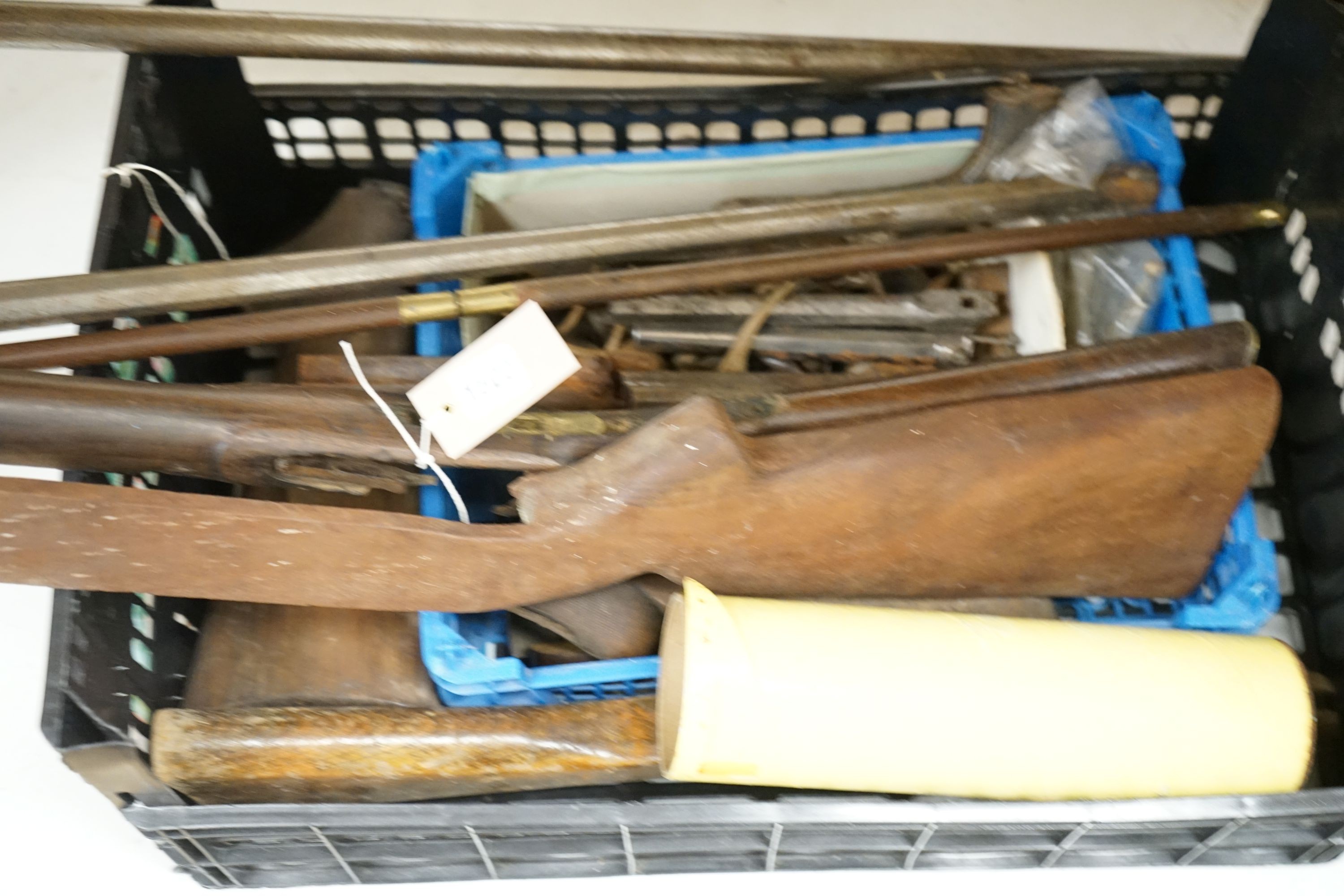 A quantity of gun components, stocks, barrels etc.